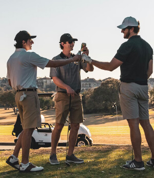 friends playing golf